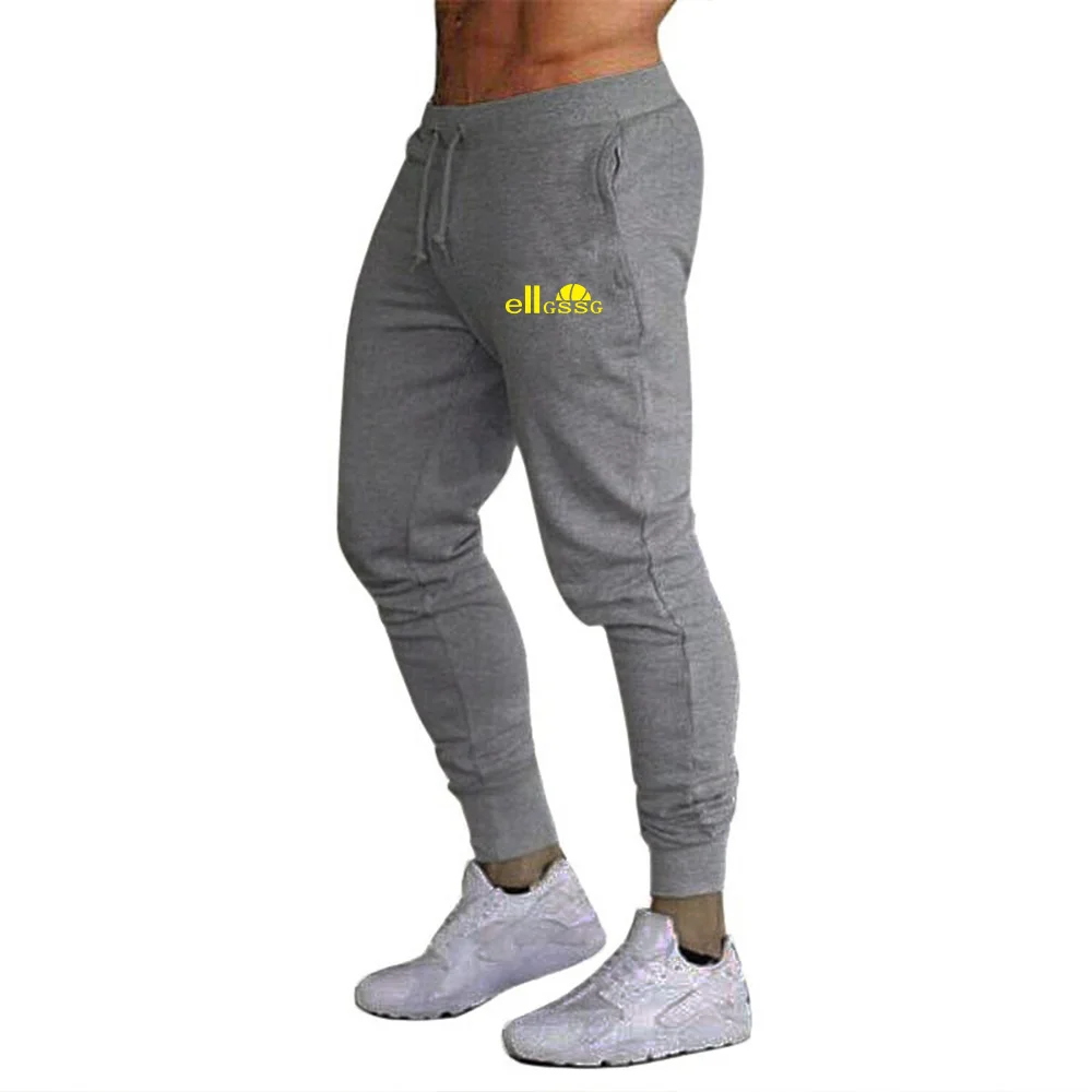 

Fashion men's casual sports pants tie rope cotton and linen sports pants solid color printing version of slim simple men's pants