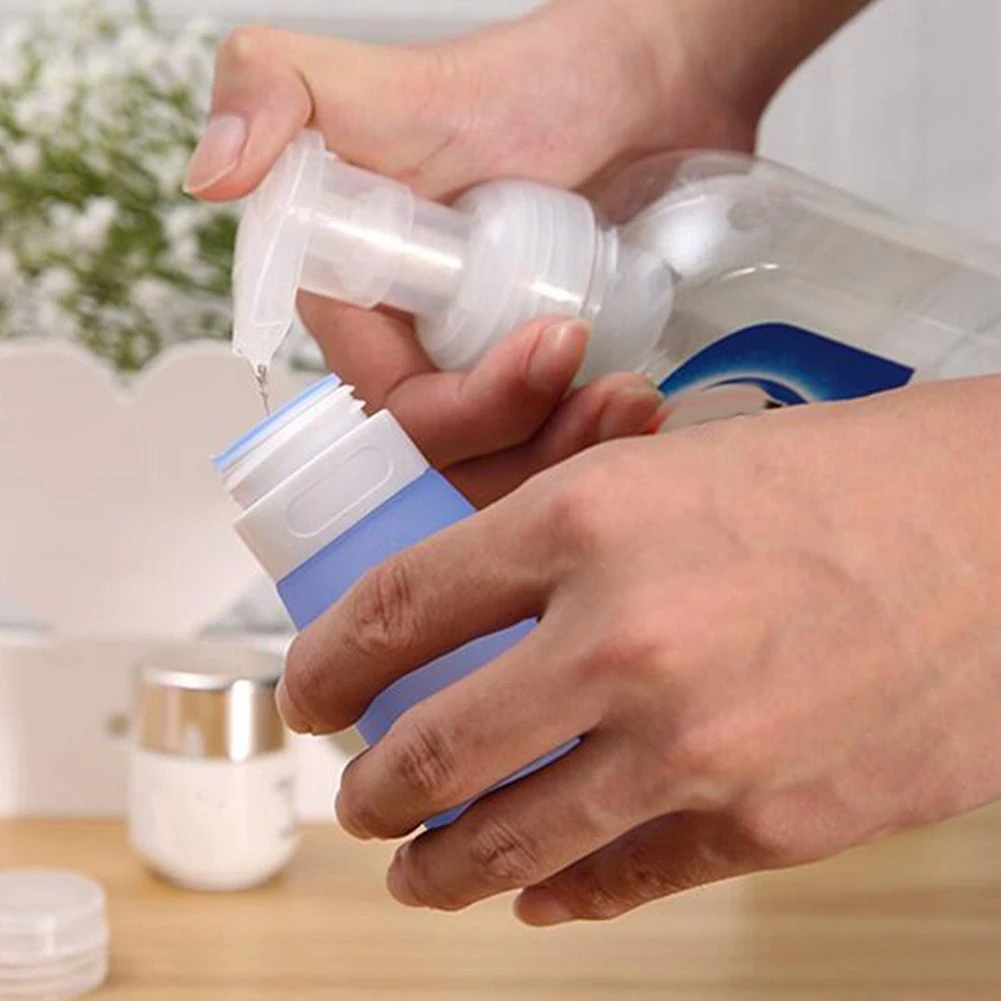 

Hot Selling Portable Silicone Refillable Mini Traveler Packing Bottle Press Bottle for Lotion Shampoo Bath Accessories