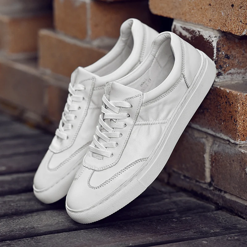 Jual Sepatu Kasual Pria Datar Musim Gugur Keluaran Baru Sneakers Kasual Pria Kulit Asli Sepatu Putih Pria Kualitas Baik Alas Kaki Merek Populer