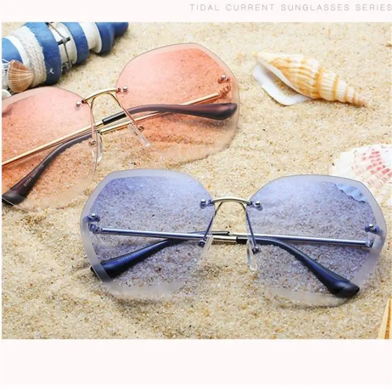 Женские солнцезащитные очки без оправы с прозрачной металлической оправой