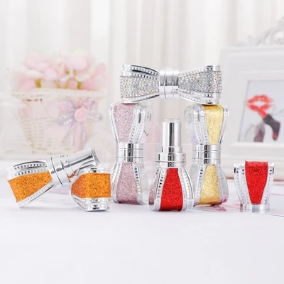 

NEW Wholesale 12.1mm diamond bowknot Lipstick Tube High Grade Lip Balm Tubes Cosmetic Refillable Bottles Magnetic Snap Tubes