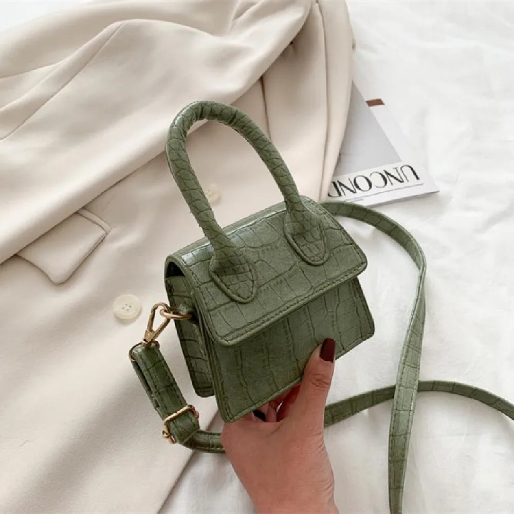 

Fashionable woman bag new mini handbag stone grain contracted foreign air joker single shoulder slant mobile phone bag for woman