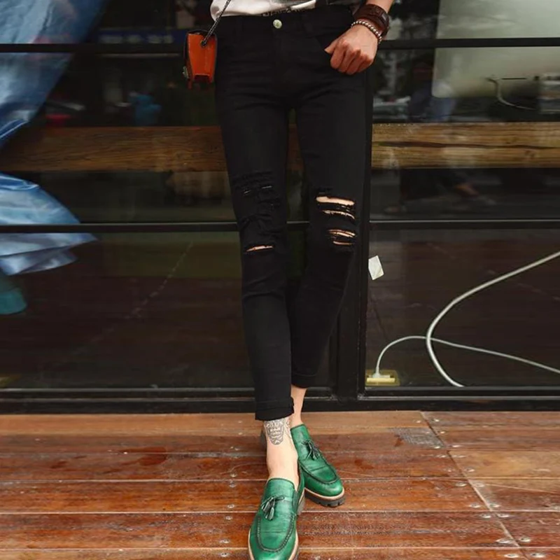 Мужские джинсы с вырезами на коленях черные в европейском и американском стиле