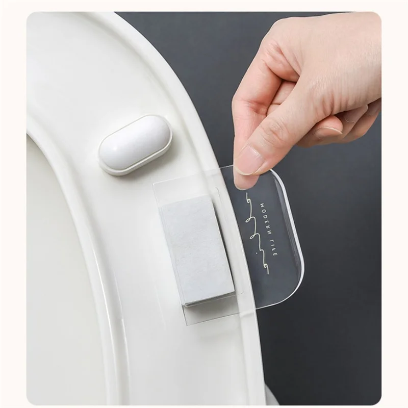 

Toilet Seat Holder Lifter Sanitary Closestool Seat Cover Lift Handle Toilet Seat Cover Lifter Bathroom Home Cleaning Tool Hogar