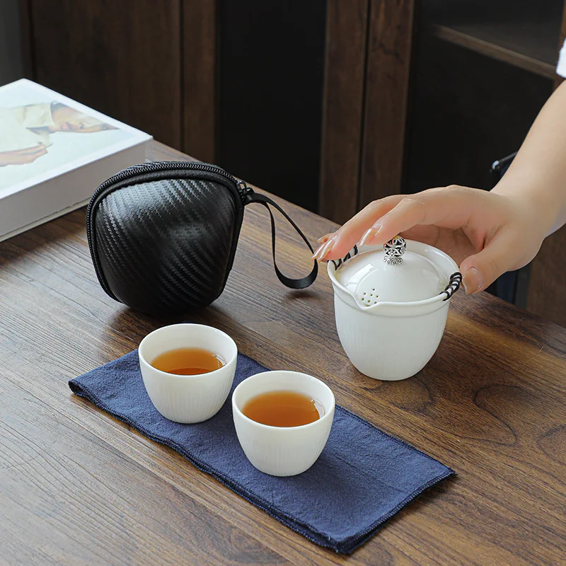 

Suet jade kung fu tea set a full range of portable office with a pot of two cups of outdoor tea business gifts