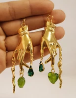 serpent snake earrings with green heart