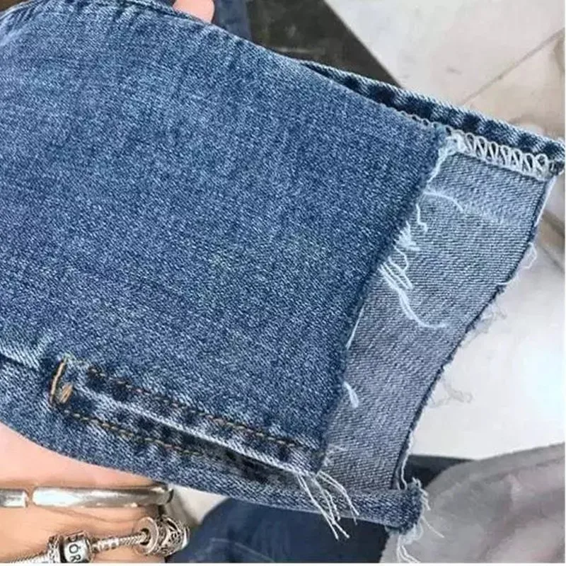 

Plus Size 4XL Womens Stretch Denim Skinny Trousers Ripped Jeans For Women Hole Vintage Pencil Pants High Elasticity Trousers