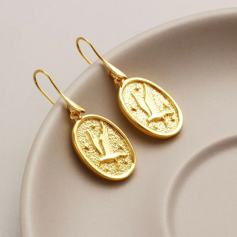

New gold color fashion creative vintage bird earrings oval metallic women's earrings