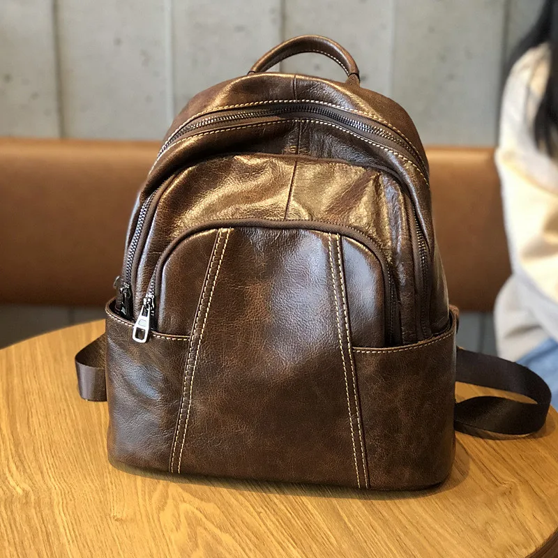 

Fashion luxury natural cowhide leather ladies large-capacity Shoulders backpack retro simple wild outdoor coffee school bag