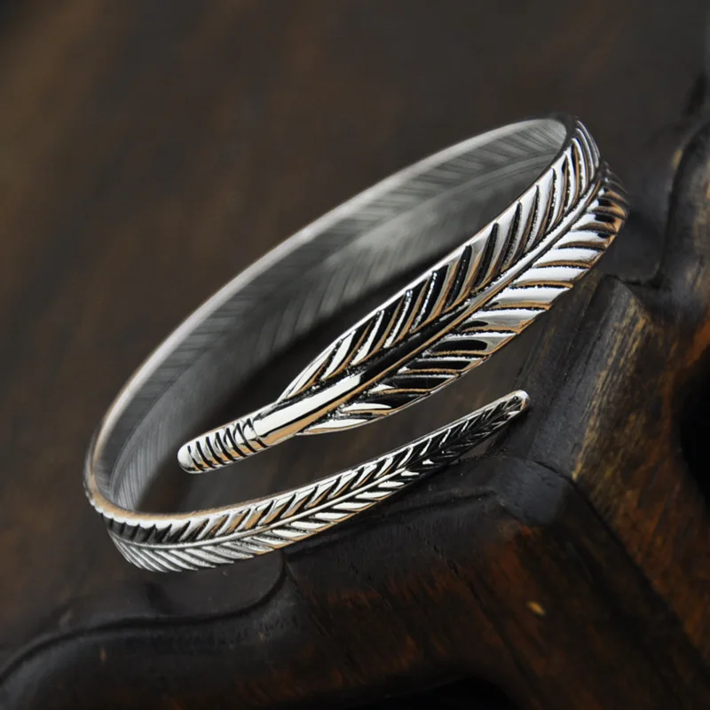 

New men's and women's sterling silver retro feather open bracelet fashion trend jewelry gift 165