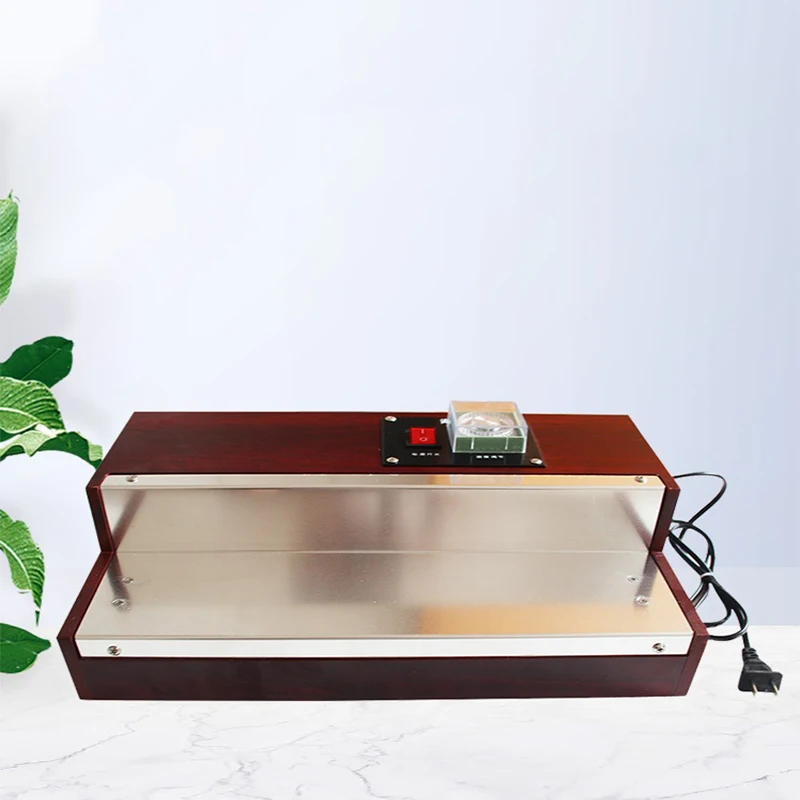 Термоусадочная машина для упаковки пленки для парфюмерной коробки, сигарет, косметики, блока игральных карт и блистерной упаковки.