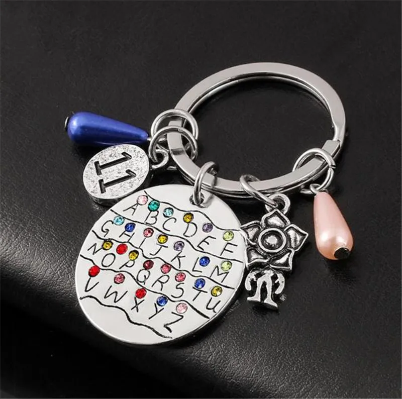 

Anime Stranger Things Keychains Alphabet Cannibal Letter Charms Metal Car Crystal Keyring Lady Choker Jewelry Accessories Gifts