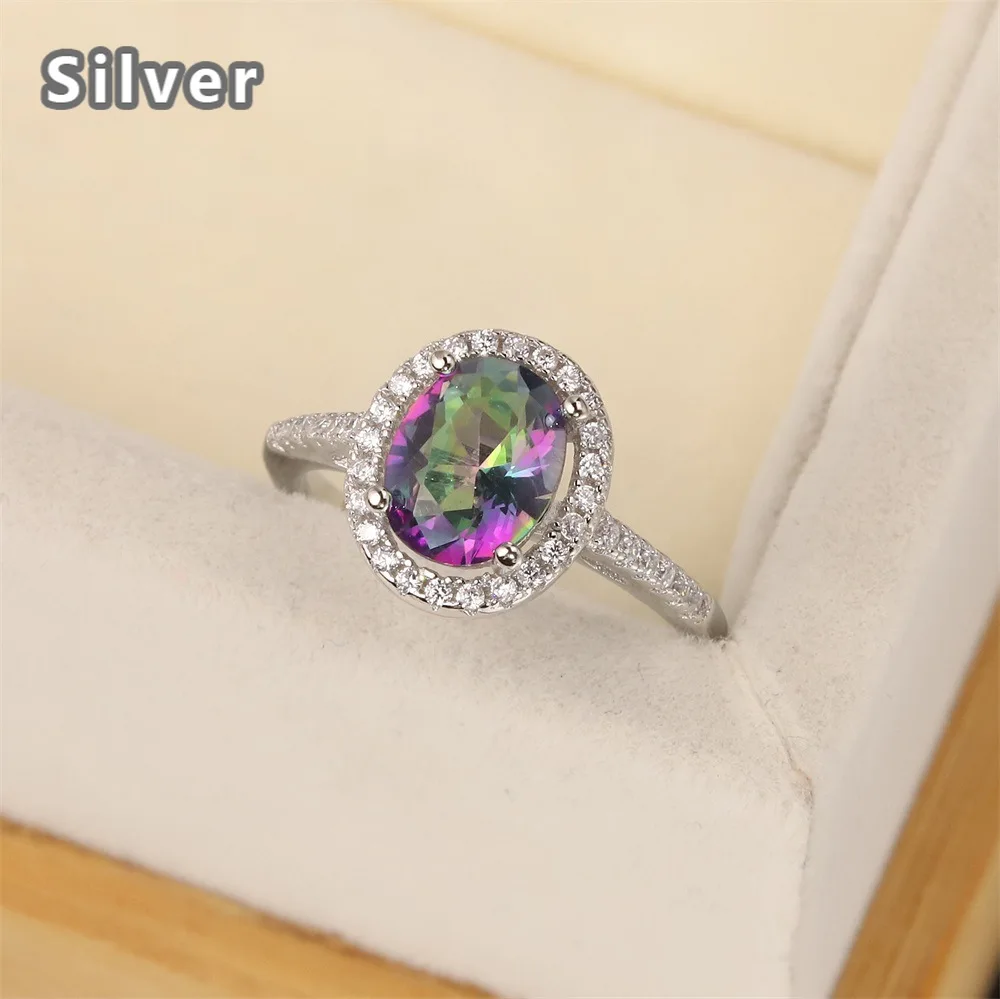 

European and American S925 Silver Ring women's fashion diamond inlaid with oval egg shaped Seven color Topaz color gem gift