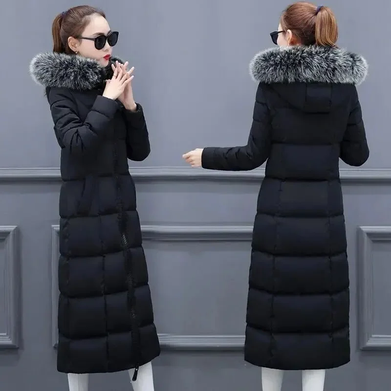 The 2021 winter padded jacket is longer than the knee thick, slim and warm women's padded jacket
