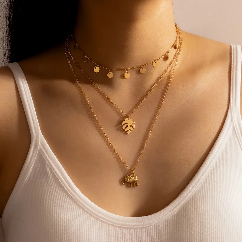 

HuaTang Vintage Gold Elephant Pendant Necklace for Women Multilayer Metal Leaves Sequin Charming Choker Female Party Jewelry