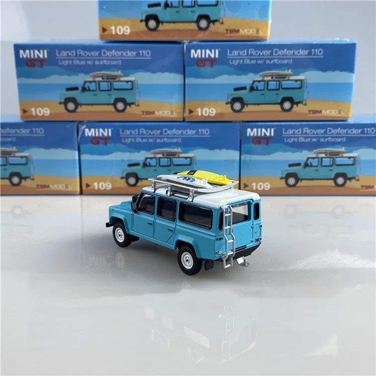 

MINI GT 1:64 Land Rovers Defender 110 With a surfboard