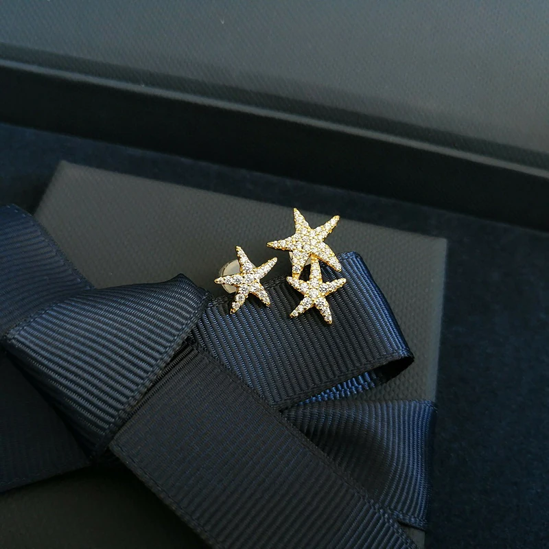 

Starfish asymmetric Earrings 925 Sterling Silver micro inlaid zircon exquisite fashion elegant high-end women's model