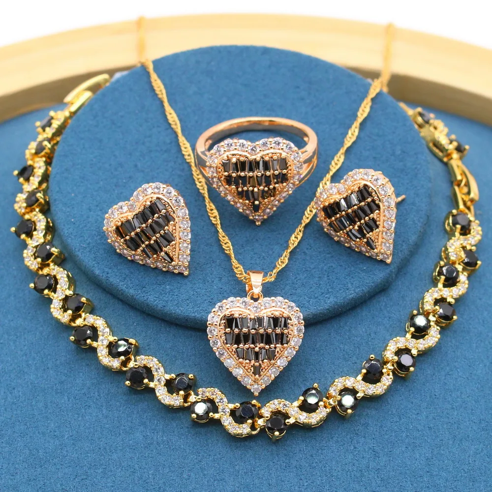 

Женский ювелирный комплект из колье, сердца и браслета