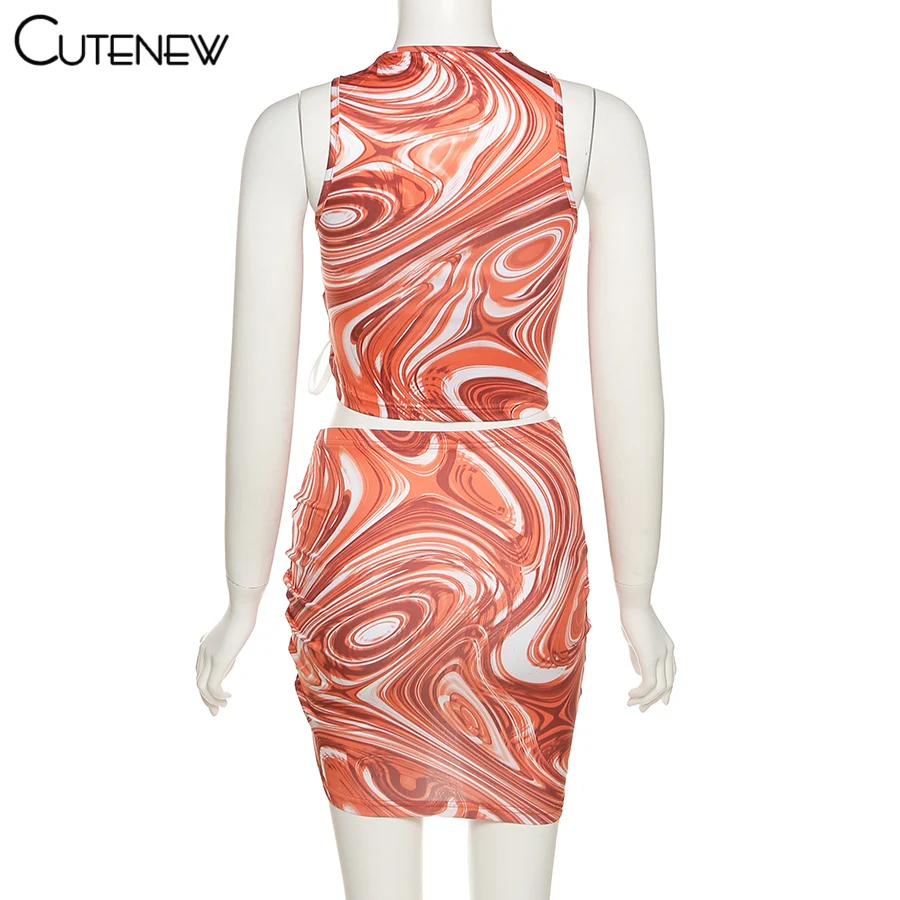 

Cutenew Summer Print Two Piece Sets Womens Clothes O-Neck Sleeveless Aesthetic Crop Top+Hipster Skinny Mini Skirt Sexy Club Suit