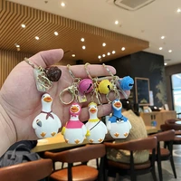 european and american popular cartoon anime ornaments cute travel duck keychain resin bag pendant small gift ideas