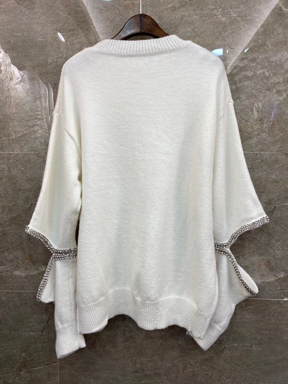

2020 autumn and winter fashion new ladies diamond-studded irregular sleeve solid color sweater 1203