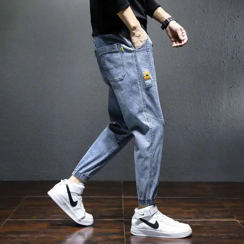 

Jeans men's fashion brand new loose tooling in autumn and winter