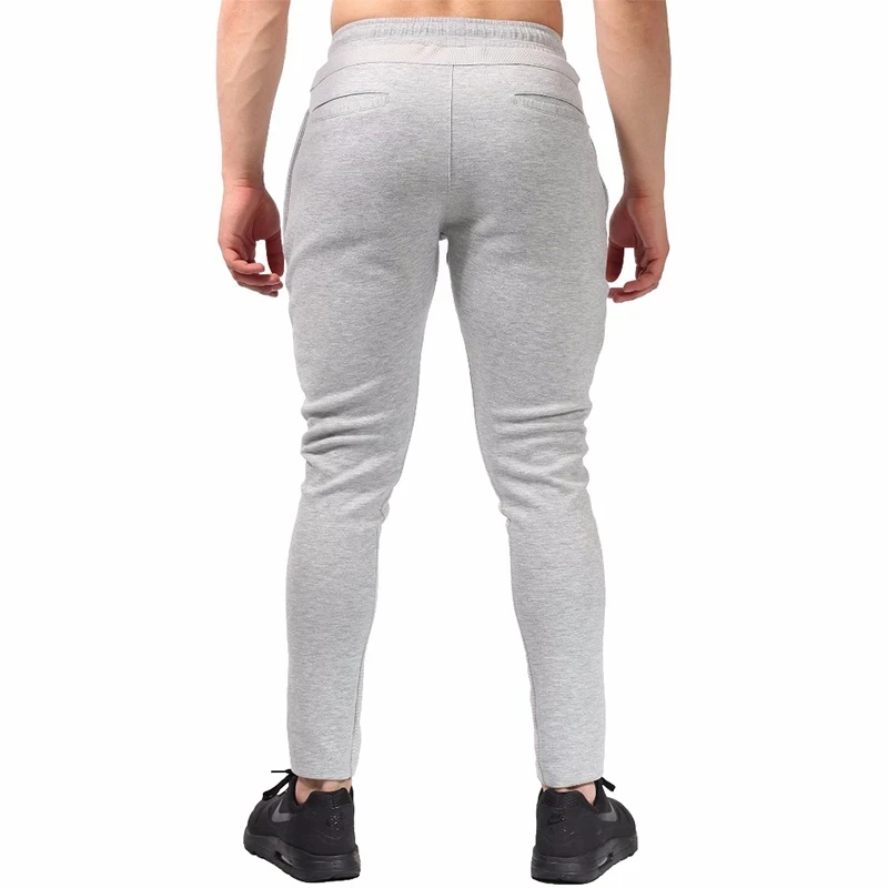 

2021 New sweatpants Men's solid workout bodybuilding clothing casual GYMS fitness sweatpants joggers pants skinny trousers