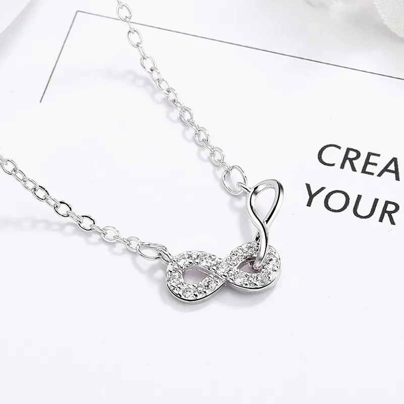Женская цепочка серебряного цвета с кубическим цирконием и бантом | Украшения
