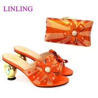 new sweet arrival nigerian fashion colorful crystal style party ladies shoes and bag set with streamer modeling in orange color