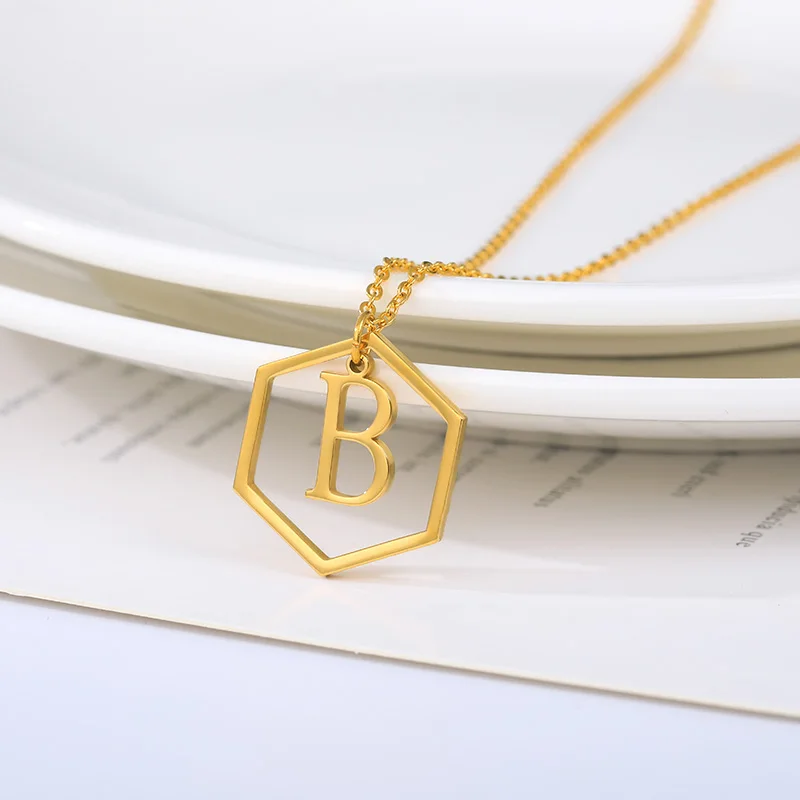 

Оптовая продажа, 26 шт., стандартные подвески, ожерелья для женщин, табличка с именем, ювелирные изделия из нержавеющей стали, шестигранное ож...