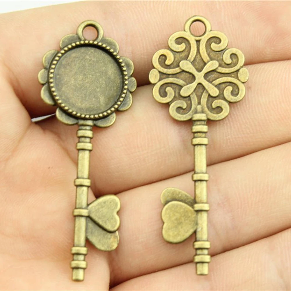 

5pcs 14mm Inner Size 52x20mm Outer Size Antique Bronze Antique Silver Color Zinc Alloy Key Cameo Cabochon Base Setting