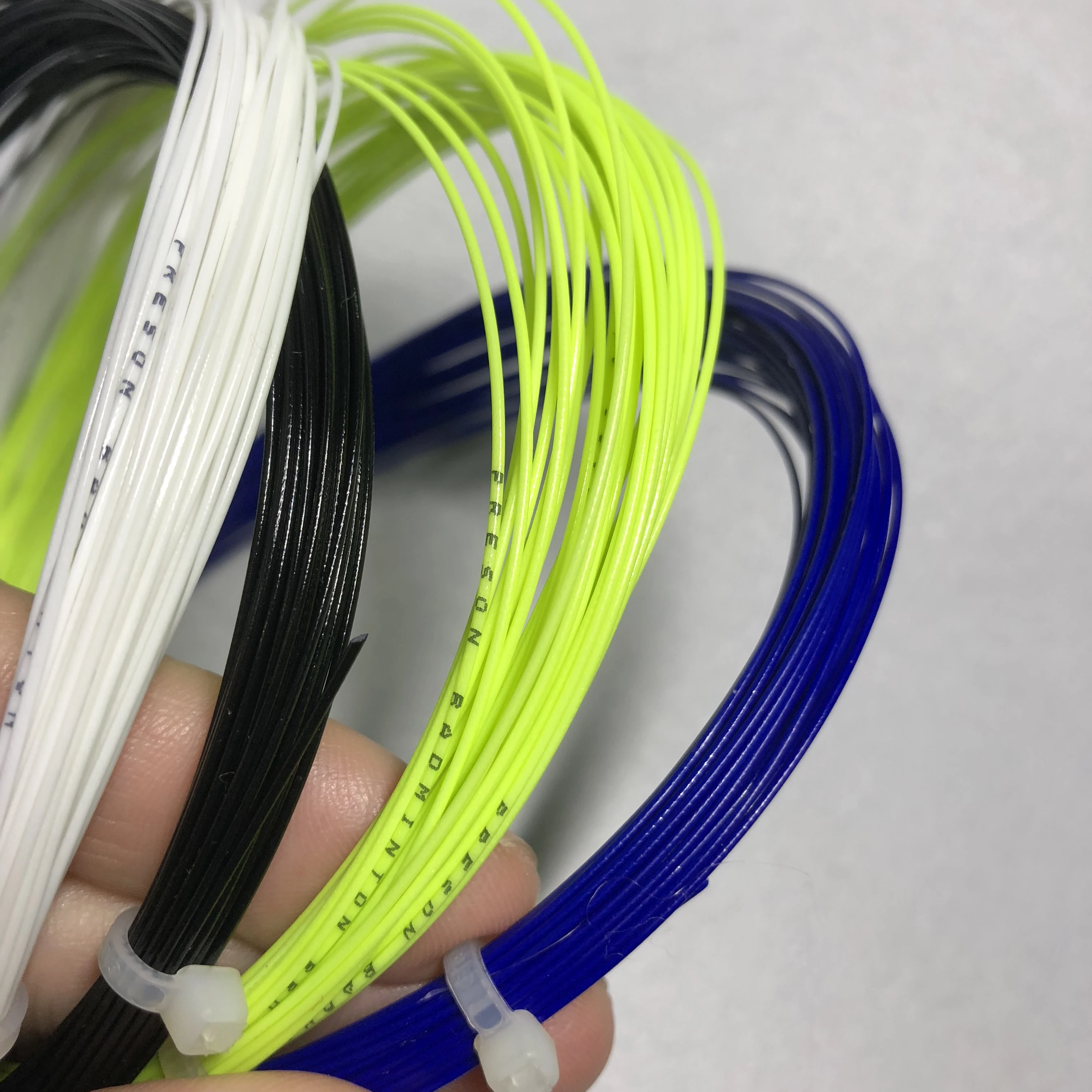 50pcs TAAN Badminton strings 0.7 mm Bulk Durable Resistance training badminton no packing |
