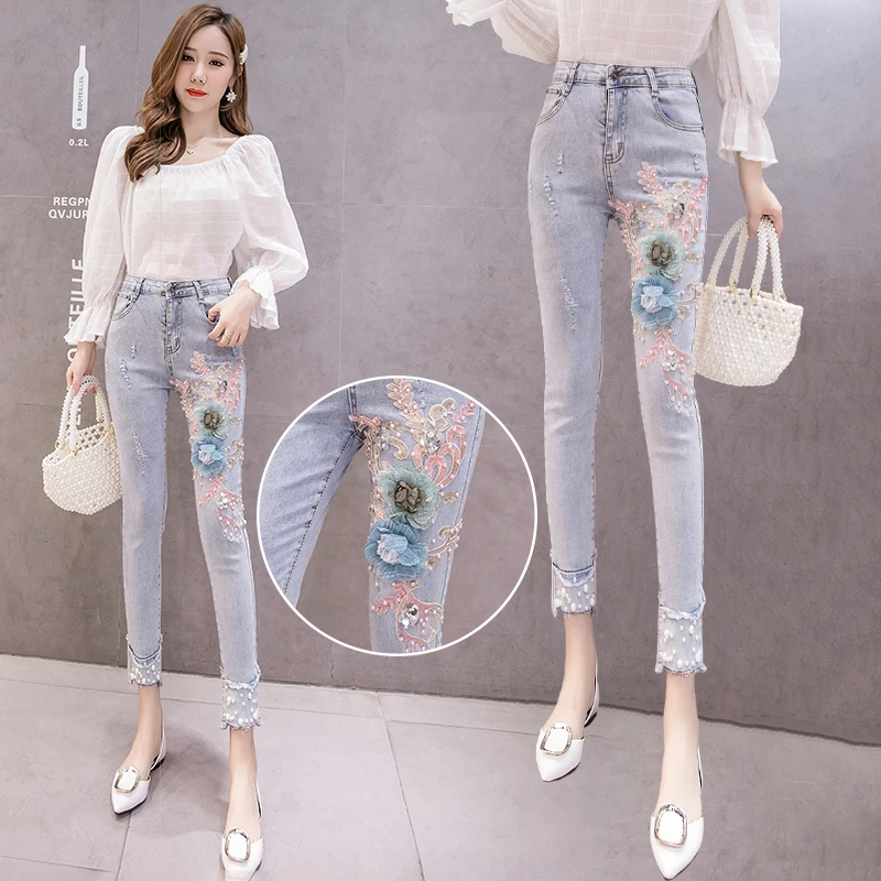 

Film pearl embroidery jeans female the spring and autumn period and the new women's pants show thin joker nine points feet penci