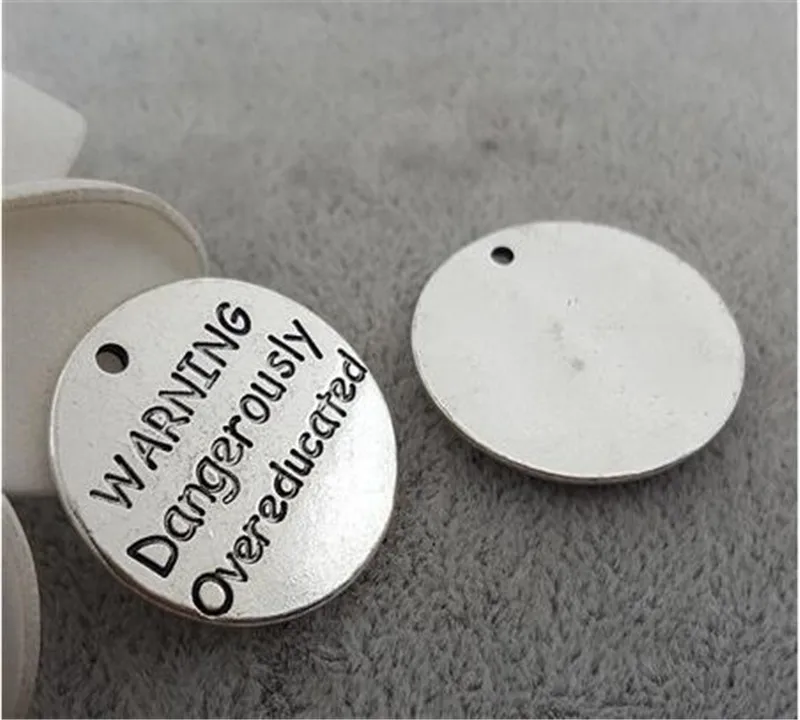 

20 pcs/Lot 25mm Antique Silver colour letter printed WARNING Dangerously Overeducated charm round disc message charms