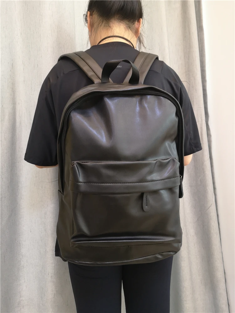 

2020 NEW Original Design Fashion Simple Couple Pure Color Backpack & PU Leather Material Width 30cm Height 40cm Thickness 10cm