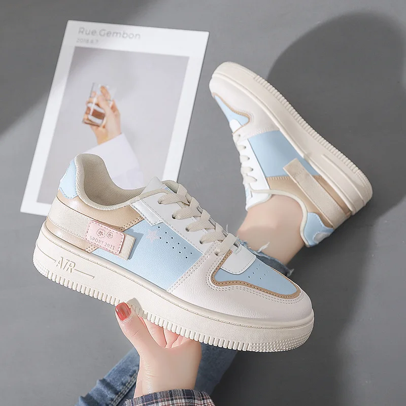 The new spring 2021 white shoe female ins tide color matching han edition breathable leisure sport light and comfortable shoe