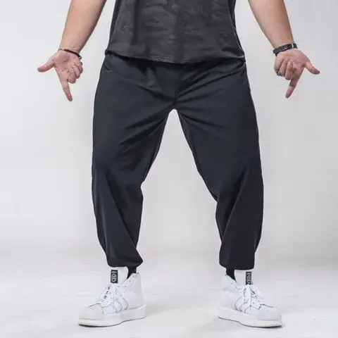 

Pantalones de chndal de talla grande para hombre, pantaln holgado, informal, estilo hip hop, camuflaje, 5XL, 2021