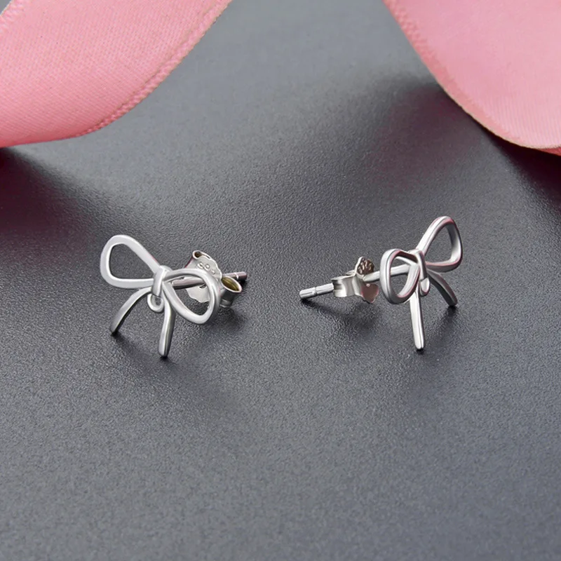 

Japanese and Korean simple earrings S925 pure silver personality sweet bows silver studs female popular jewelry