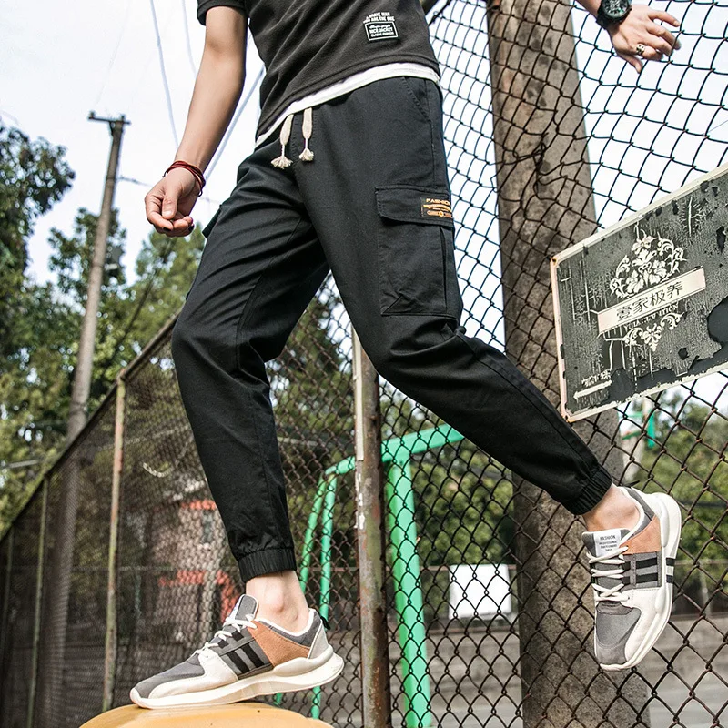 Мужские брюки карго с карманами фиолетовые ребристые тактические надписью для