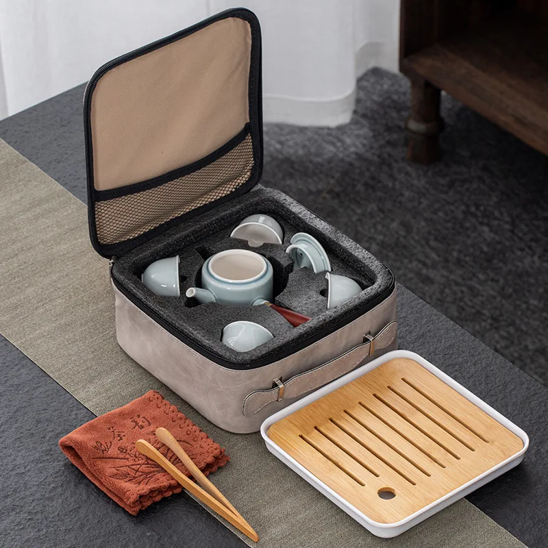 

Портативный дорожный чайный набор с боковой ручкой, один чайник, четыре чашки, простые Роскошные деловые керамические подарки, китайская ви...