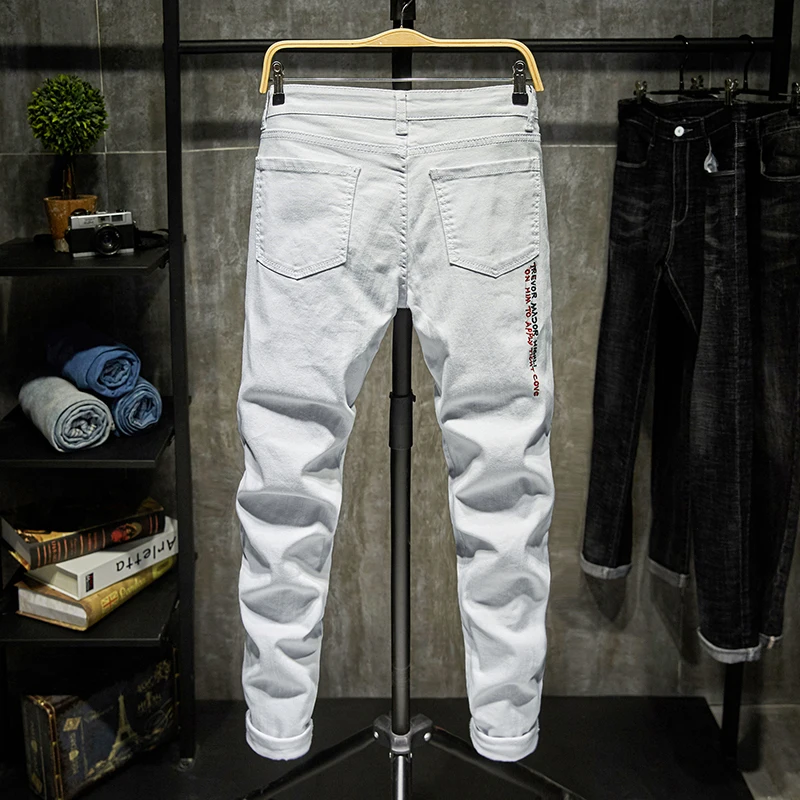 Джинсы мужские с вышивкой и надписью модные облегающие модельные брюки из денима