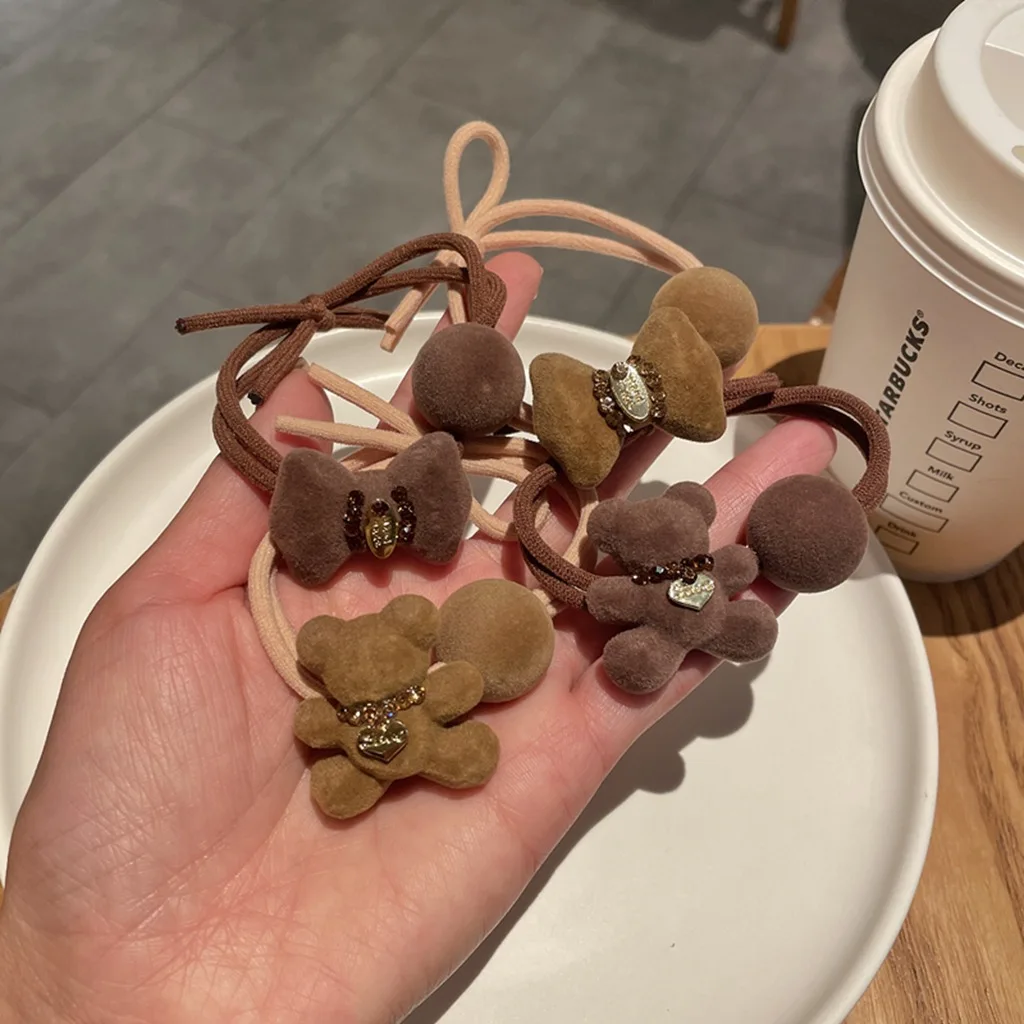 

Winter 2021 New Flocking Bear Head Rope Girl Cute Headdress Net Red Temperament Tie Hair Rubber Band Leather Case