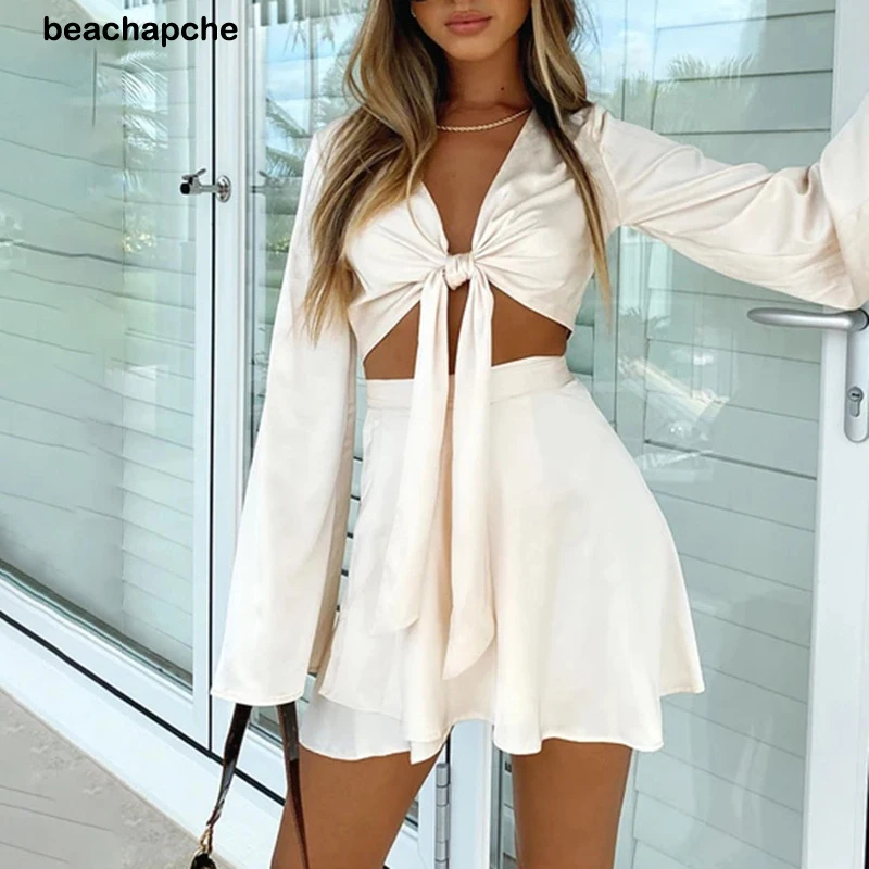 

Beachapche Satin Sexy Women Two Piece Set V Neck Flare Sleeve Bandage Crop Top Elastic Waist Mini Skirt 2021Summer Beach Style