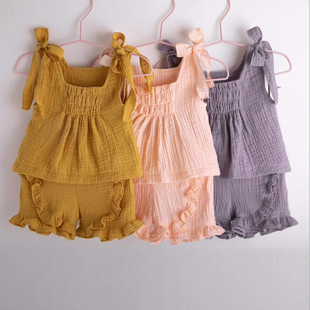 

Summer Cartoon Toddler Baby Girl Clothes Solid Color Sleeveless Tops Ruffle Short Pants 2Pcs Outfits Cotton Casual Clothes