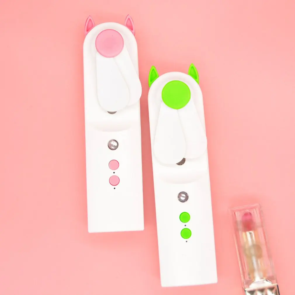 

New portable nanometer water replenishment instrument Mini fan with handheld humidifier Plastic Ordinary round Piano keys