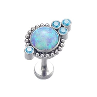 g23 titanium internally threaded blue opal cluster tragus piercing