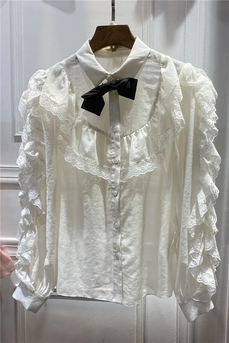 

French 2021 spring new brooch bowknot heavy silk cotton shirt ruffles female temperament two-piece blouse