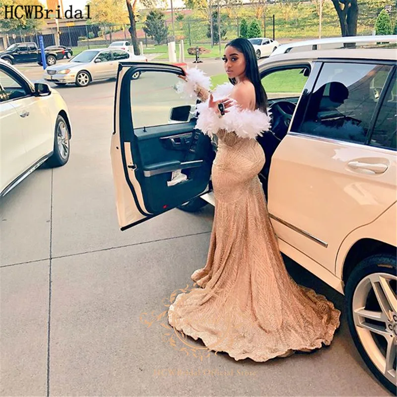 

Champagne Glitter Mermaid Long Sleeves African Prom Dresses With White Feathers Off The Shoulder Side Slit Sexy Evening Gowns