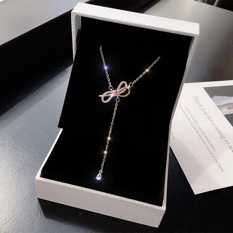 

Real Gold Plated Bow Necklace Female Personality Simple Crystal Tassel Pendant Net Red Short Necklace Clavicle Chain