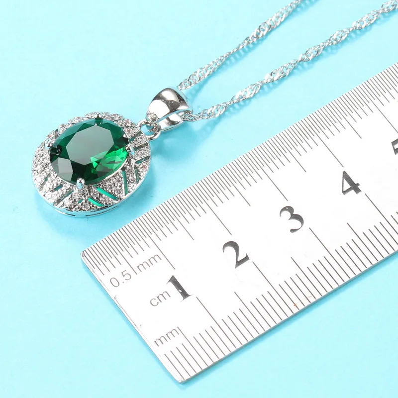 Женский ювелирный комплект Свадебный костюм из серебра 925 пробы с зеленым